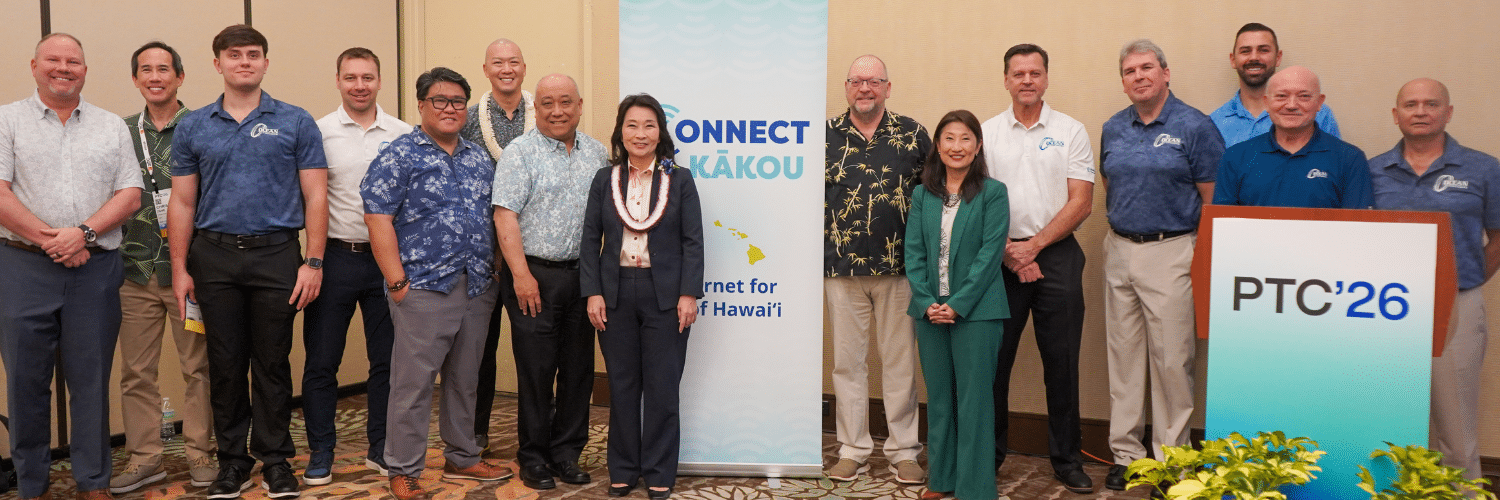 Lt. Gov. Sylvia Luke and group of digital infrastructure and tech leaders smiling for a group photo.